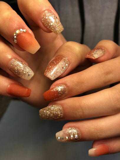 Orange Glitter Nails